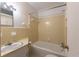 Bathroom featuring a tiled shower and tub, sink, toilet, and ample storage at 705 White Oak Dr., Johnsonville, SC 29555