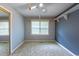 Bedroom with mirrored closet doors and a window at 705 White Oak Dr., Johnsonville, SC 29555