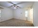 Simple bedroom with ceiling fan and neutral carpeting at 705 White Oak Dr., Johnsonville, SC 29555