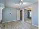 Bedroom featuring neutral colored walls, carpeting, and closet space at 705 White Oak Dr., Johnsonville, SC 29555