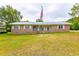 Ranch style brick house with a landscaped yard at 705 White Oak Dr., Johnsonville, SC 29555