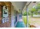 Welcoming front porch with brick facade and inviting decor at 705 White Oak Dr., Johnsonville, SC 29555