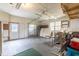A large garage space with shelving and natural light from windows at 705 White Oak Dr., Johnsonville, SC 29555