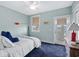 Bright bedroom with a queen bed and access to a balcony at 5207 Ocean Blvd. N, North Myrtle Beach, SC 29582