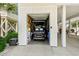 Garage with golf cart and storage space at 5207 Ocean Blvd. N, North Myrtle Beach, SC 29582