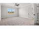 Bright bedroom with carpet and a view from window at 1405 Crooked Hook Rd., North Myrtle Beach, SC 29582