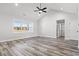 Bright bonus room with wood-look floors and large window at 1405 Crooked Hook Rd., North Myrtle Beach, SC 29582