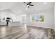 Open living space with kitchen island and vaulted ceiling at 1405 Crooked Hook Rd., North Myrtle Beach, SC 29582