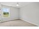 Bedroom with large window and neutral carpeting at 1509 Crooked Hook Rd., North Myrtle Beach, SC 29582