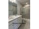 Modern bathroom with double vanity and glass shower at 1327 Winding Creek Way, Myrtle Beach, SC 29588