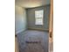 Bright bedroom with carpet and a window at 1327 Winding Creek Way, Myrtle Beach, SC 29588