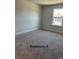 Spacious bedroom with carpet and window at 1327 Winding Creek Way, Myrtle Beach, SC 29588