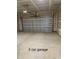 Two-car garage with concrete floor at 1327 Winding Creek Way, Myrtle Beach, SC 29588