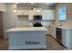 Modern kitchen featuring white cabinetry and a large island at 1327 Winding Creek Way, Myrtle Beach, SC 29588