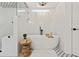 Bathroom with a freestanding bathtub and hexagon tile floors at 2192 Eastwoods Dr., Conway, SC 29526