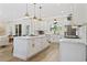 White kitchen with marble countertops and island with seating at 2192 Eastwoods Dr., Conway, SC 29526