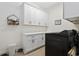 Laundry room with white cabinets and quartz countertops at 2192 Eastwoods Dr., Conway, SC 29526