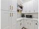 Well-organized pantry with ample shelving and countertop space at 2192 Eastwoods Dr., Conway, SC 29526