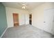 Bedroom with carpet, ceiling fan and access to bathroom at 110 South Shore Blvd. # 202, Longs, SC 29568