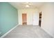 Bedroom with carpet, ceiling fan and access to bathroom at 110 South Shore Blvd. # 202, Longs, SC 29568