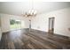 Spacious living room with hardwood floors and neutral walls at 110 South Shore Blvd. # 202, Longs, SC 29568