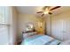 Bedroom with a queen bed, ceiling fan, and light wood floors at 81 Delray Dr. # 3-D, Murrells Inlet, SC 29576