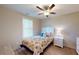 Bedroom with a queen bed, ceiling fan, and light wood floors at 81 Delray Dr. # 3-D, Murrells Inlet, SC 29576