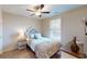 Bedroom with a queen bed, ceiling fan, and light wood floors at 81 Delray Dr. # 3-D, Murrells Inlet, SC 29576