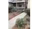 Cozy entrance path leading to the front door with plants at 118 Salt Marsh Circle # 25B, Pawleys Island, SC 29585