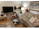 Cozy living room with a comfortable couch, a TV, and decorative elements at 118 Salt Marsh Circle # 25B, Pawleys Island, SC 29585