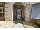 Charming front entrance featuring a brick archway and decorative details at 2000 Kilkee Dr., Myrtle Beach, SC 29579