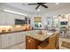 Bright kitchen featuring granite countertops, stainless appliances, and ample cabinet space at 2000 Kilkee Dr., Myrtle Beach, SC 29579