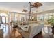 Spacious open-concept living room with hardwood floors and multiple seating areas at 2000 Kilkee Dr., Myrtle Beach, SC 29579