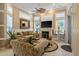 Inviting living room with fireplace, comfortable seating, and abundant natural light at 2000 Kilkee Dr., Myrtle Beach, SC 29579