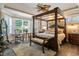 Comfortable main bedroom with sitting area and large windows at 2000 Kilkee Dr., Myrtle Beach, SC 29579