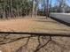 Spacious backyard featuring mature trees, natural surroundings, and plenty of room for outdoor activities at 1738 Cenith Dr., North Myrtle Beach, SC 29582