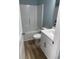 Clean bathroom with a white vanity, toilet, and tub/shower combo, offering a functional and comfortable space at 1738 Cenith Dr., North Myrtle Beach, SC 29582