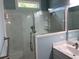 A bathroom with a marble shower stall and a marble vanity sink at 1738 Cenith Dr., North Myrtle Beach, SC 29582