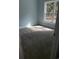 Cozy bedroom with plush carpeting and a large window providing natural light and views of the outdoors at 1738 Cenith Dr., North Myrtle Beach, SC 29582