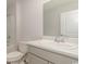 Clean bathroom with gray vanity and a large mirror at 3869 Lady Bug Dr., Shallotte, NC 28470