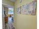 View through a doorway to a bedroom area featuring neutral tones and plenty of light at 122 Hartland Dr. # 11-D, Myrtle Beach, SC 29572