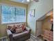 Sitting area near a bedroom window offering a relaxing space to unwind at 122 Hartland Dr. # 11-D, Myrtle Beach, SC 29572