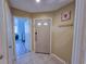 Welcoming entryway with neutral tones, coat rack, tile flooring, and access to other rooms at 122 Hartland Dr. # 11-D, Myrtle Beach, SC 29572