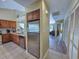 Well-equipped kitchen with stainless steel appliances and wood cabinetry at 122 Hartland Dr. # 11-D, Myrtle Beach, SC 29572
