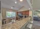 Well-equipped kitchen with granite countertops and stainless steel appliances, offering a functional and stylish cooking space at 122 Hartland Dr. # 11-D, Myrtle Beach, SC 29572