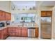 Well-equipped kitchen with stainless steel appliances and granite countertops for a modern touch at 122 Hartland Dr. # 11-D, Myrtle Beach, SC 29572