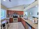 Updated kitchen with granite countertops and stainless steel appliances, perfect for culinary enthusiasts and modern living at 122 Hartland Dr. # 11-D, Myrtle Beach, SC 29572