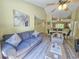 Comfortable living room seamlessly connects to the dining area, perfect for entertaining and everyday living at 122 Hartland Dr. # 11-D, Myrtle Beach, SC 29572