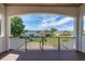 Covered balcony overlooking neighborhood and houses at 933 Bluffview Dr., Myrtle Beach, SC 29579