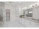 Elegant bathroom with double vanity, large mirror, and walk-in shower at 933 Bluffview Dr., Myrtle Beach, SC 29579